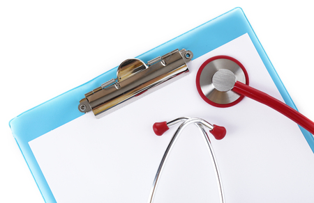 Medical stethoscope with clipboard isolated on whiteの写真素材