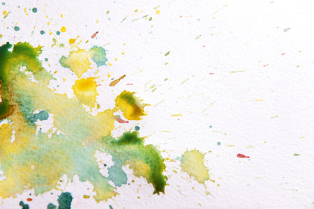 Watercolor stains on white paper background