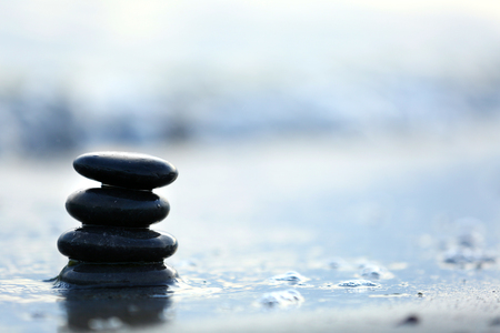 Spa stones on sea beach outdoorsの写真素材