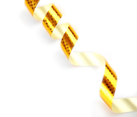 Golden serpentine isolated on whiteの写真素材