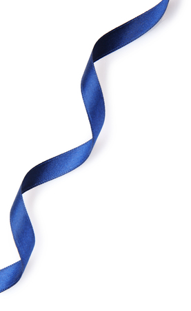 Dark blue satin ribbon isolated on whiteの写真素材