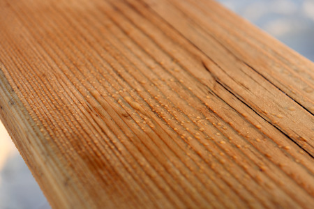 Wooden teeter on the beach, close upの写真素材