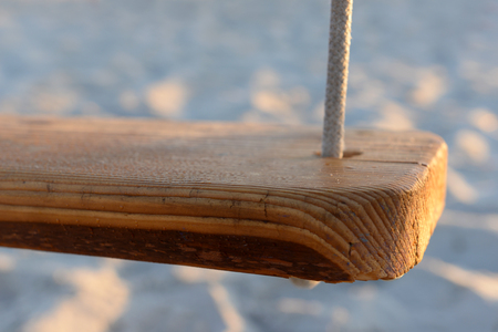 Wooden teeter on the beach, close upの写真素材