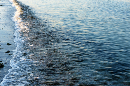 Sea surf background, close upの写真素材