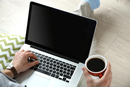 Man working with laptop at homeの写真素材