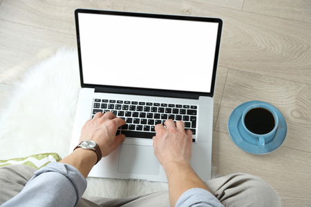 Man working with laptop at homeの写真素材