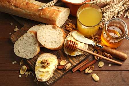 Healthy breakfast with bread, honey, nuts. Country breakfast conceptの写真素材