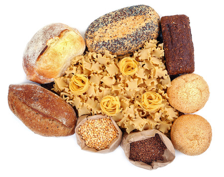 Different types of bread, pasta and cereal, isolated on whiteの写真素材