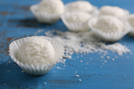 Coco sweets on color wooden backgroundの写真素材