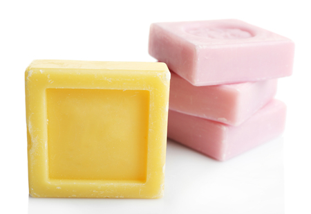 Bars of soap, isolated on white, individuality conceptの写真素材