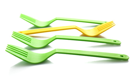 Disposable colourful forks isolated on white, Individuality conceptの写真素材
