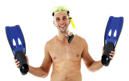 Young man with swimming mask or goggles with flippers, isolated on whiteの写真素材