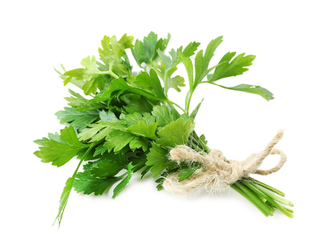 Fresh parsley isolated on whiteの写真素材