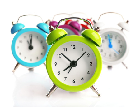 A group of alarm clocks, isolated on whiteの写真素材