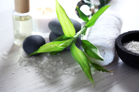 Beautiful composition of spa treatment on wooden tableの写真素材