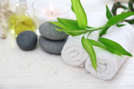 Beautiful composition of spa treatment on wooden table