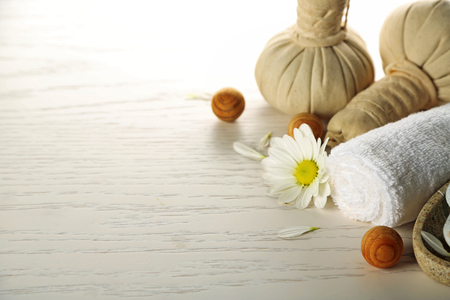 Beautiful composition of spa treatment on wooden tableの写真素材