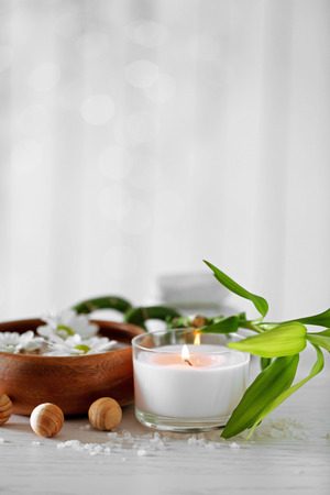 Beautiful composition of spa treatment on wooden tableの写真素材