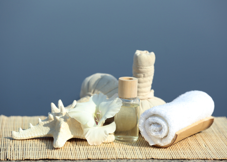 Beautiful composition of spa treatment on sea backgroundの写真素材