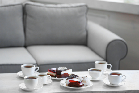 Table at home with food and drinks for friendsの写真素材