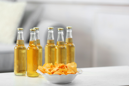 Table at home with chips and drinks for friendsの写真素材