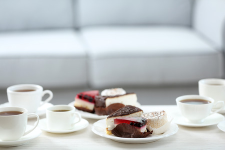 Table at home with food and drinks for friendsの写真素材