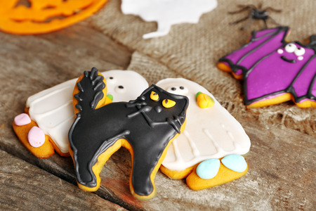 Creative cookies for Halloween party on wooden table, close upの写真素材