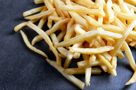 French fries on table, close-up