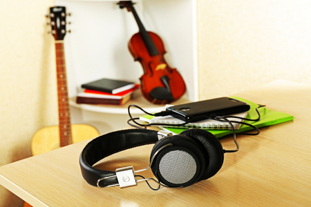 Headphones and music equipment in the roomの写真素材