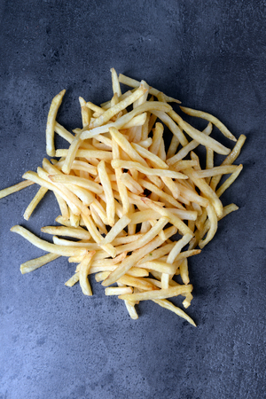 Tasty french fries on the tableの写真素材
