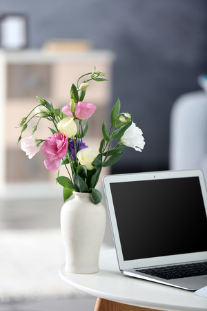 Comfortable workplace at home with laptopの写真素材