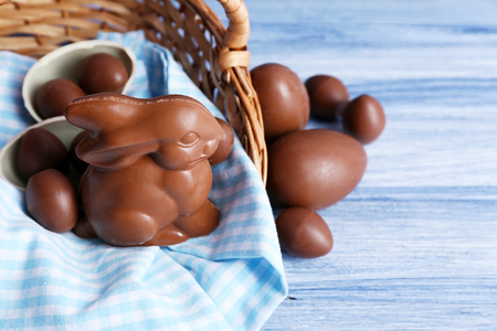 Easter chocolate bunny and eggs on wooden backgroundの写真素材