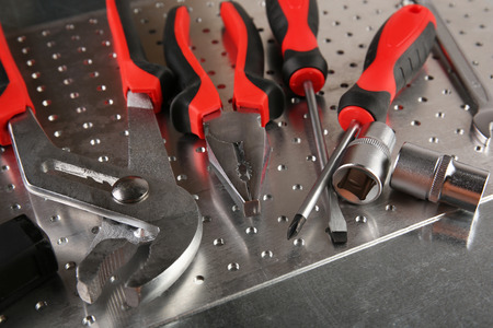 Different kinds of tools on dark background
