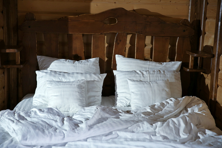 Detail of mountain wooden lodge bedroomの写真素材