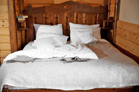 Detail of mountain wooden lodge bedroomの写真素材