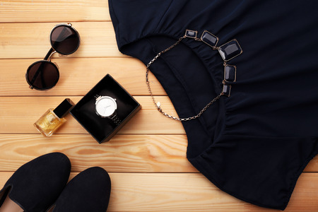 Composition of woman's fashion look on wooden backgroundの写真素材