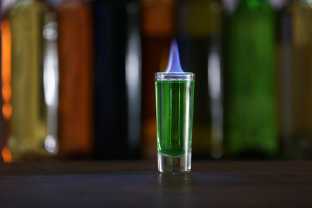 Burning cocktail on table in a barの写真素材