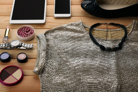 Composition of woman's fashion look on wooden backgroundの写真素材