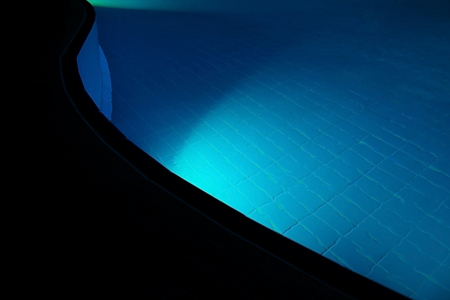 View on swimming pool at night, close-upの写真素材