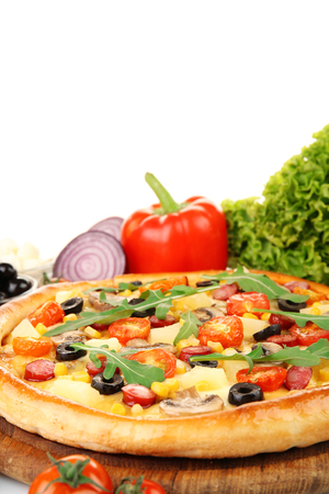 Delicious pizza with vegetables, isolated on whiteの写真素材