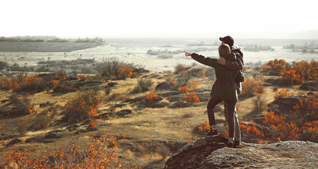 Man and woman on the top of the mountainの写真素材