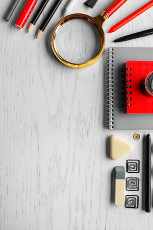 Office supplies on light wooden backgroundの写真素材