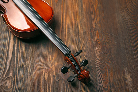 Violin on wooden backgroundの写真素材
