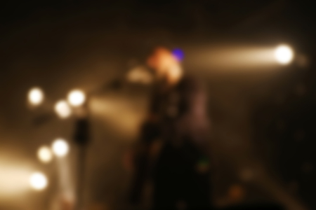Guitarist plays on rock concert, unfocusedの写真素材