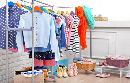 Clothes for kids on hangersの写真素材