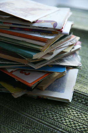 Pile of books on window board, close upの写真素材