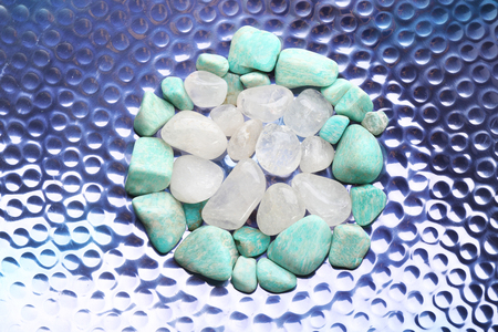 Beautiful mineral stones on bright surfaceの写真素材