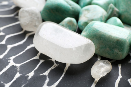 Beautiful mineral stones on dark surfaceの写真素材