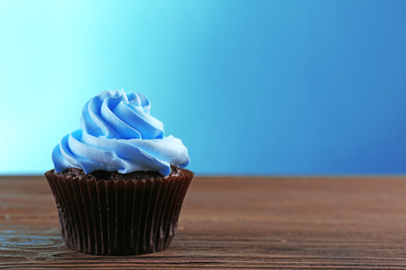 Cupcake on wooden tableの写真素材