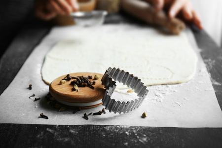 Woman cooking biscuits in kitchenの写真素材